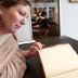 Brook Lillihaugen reading a book