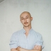Jonathan in a blue button-up shirt