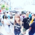 Winnie shot through a fisheye lens in crowd of people