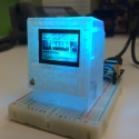 3D-printed Arduino-powered replica of a Macintosh computer running a graphical adventure game based on William Gibson's novel Neuromancer. Model by DB Bauer, University of Maryland. Used with permission.